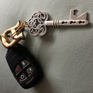 Etienne Aigner Gold (color) key chain 1Sz$38 +  free scarf